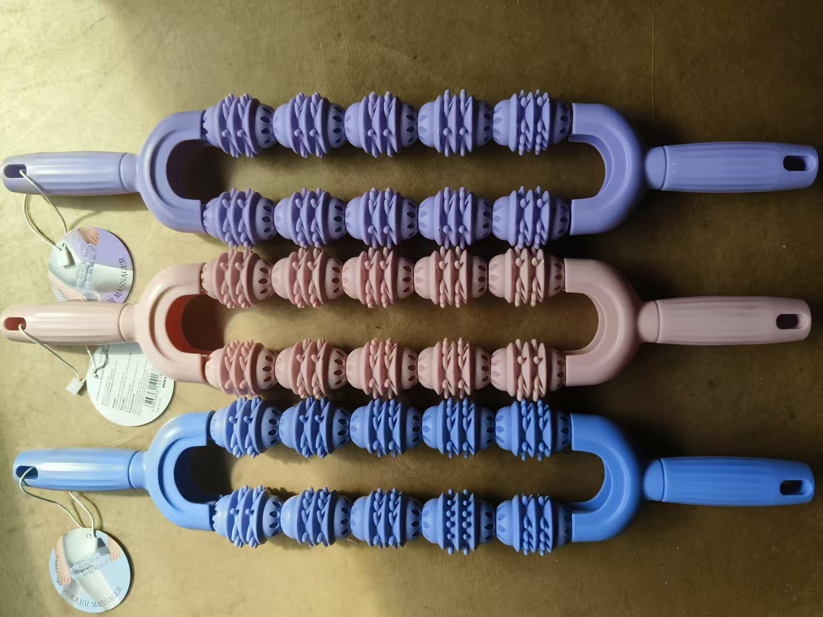 HX-0018 Double-Row Yoga Massage Roller in pink, purple and blue